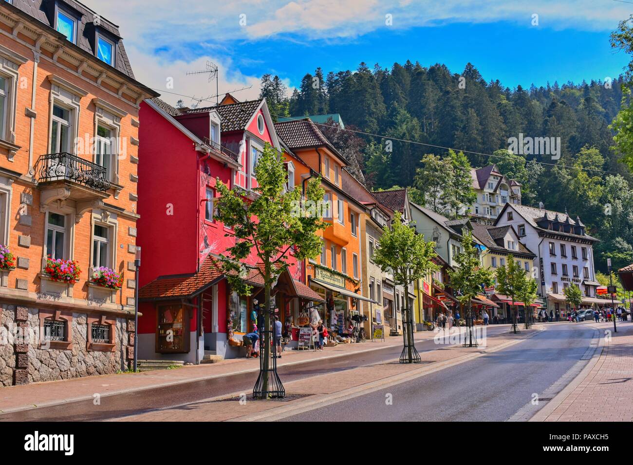 Triberg, Schwarzwald-Baar District, Germany - July 15, 2018: Colorful houses in the street of Triberg. Triberg is known for their waterfalls and cuckoo clocks. Stock Photo