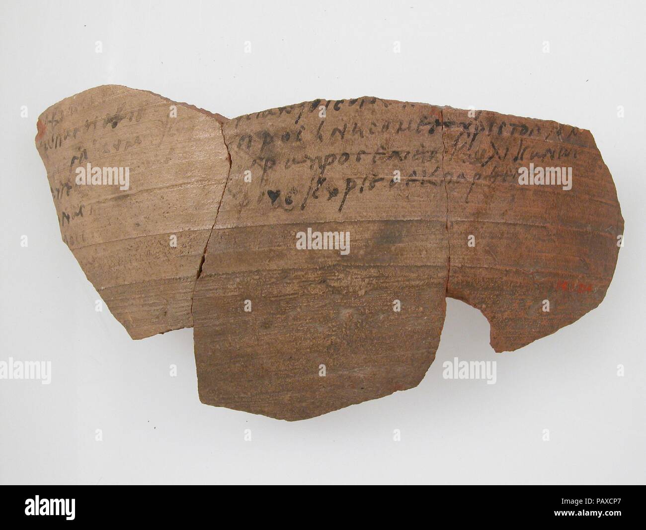 Ostrakon with Troparion (?). Culture: Coptic. Dimensions: 6 9/16 x 3 3/4 in. (16.6 x 9.5 cm). Date: 580-640. Museum: Metropolitan Museum of Art, New York, USA. Stock Photo