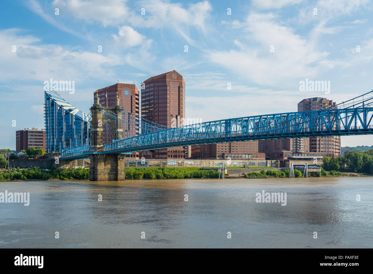 The skyline of Covington and John A. Roebling Suspension Bridge, in ...