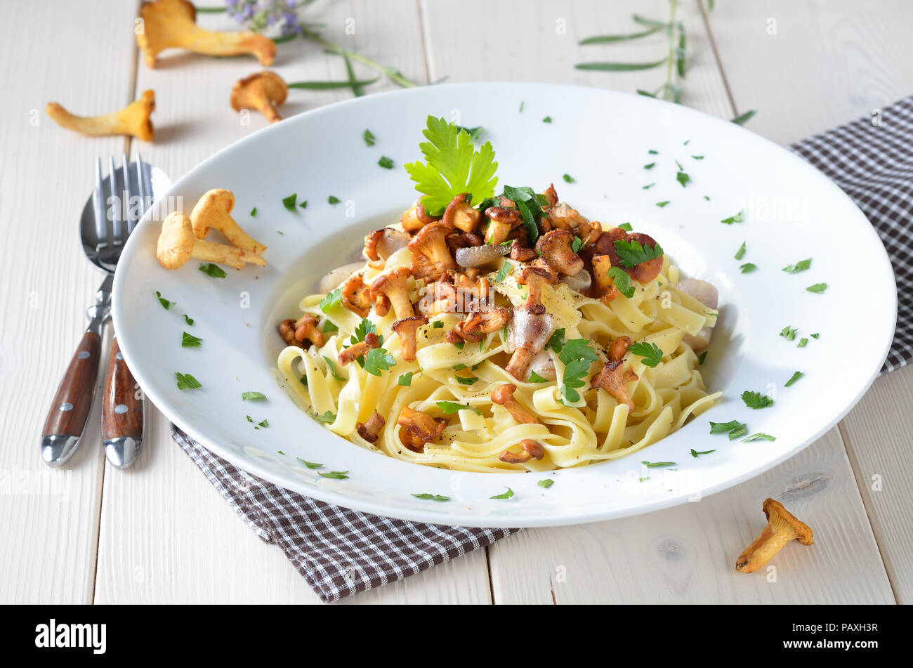 Italian tagliatelle with fried fresh chanterelles Stock Photo Alamy