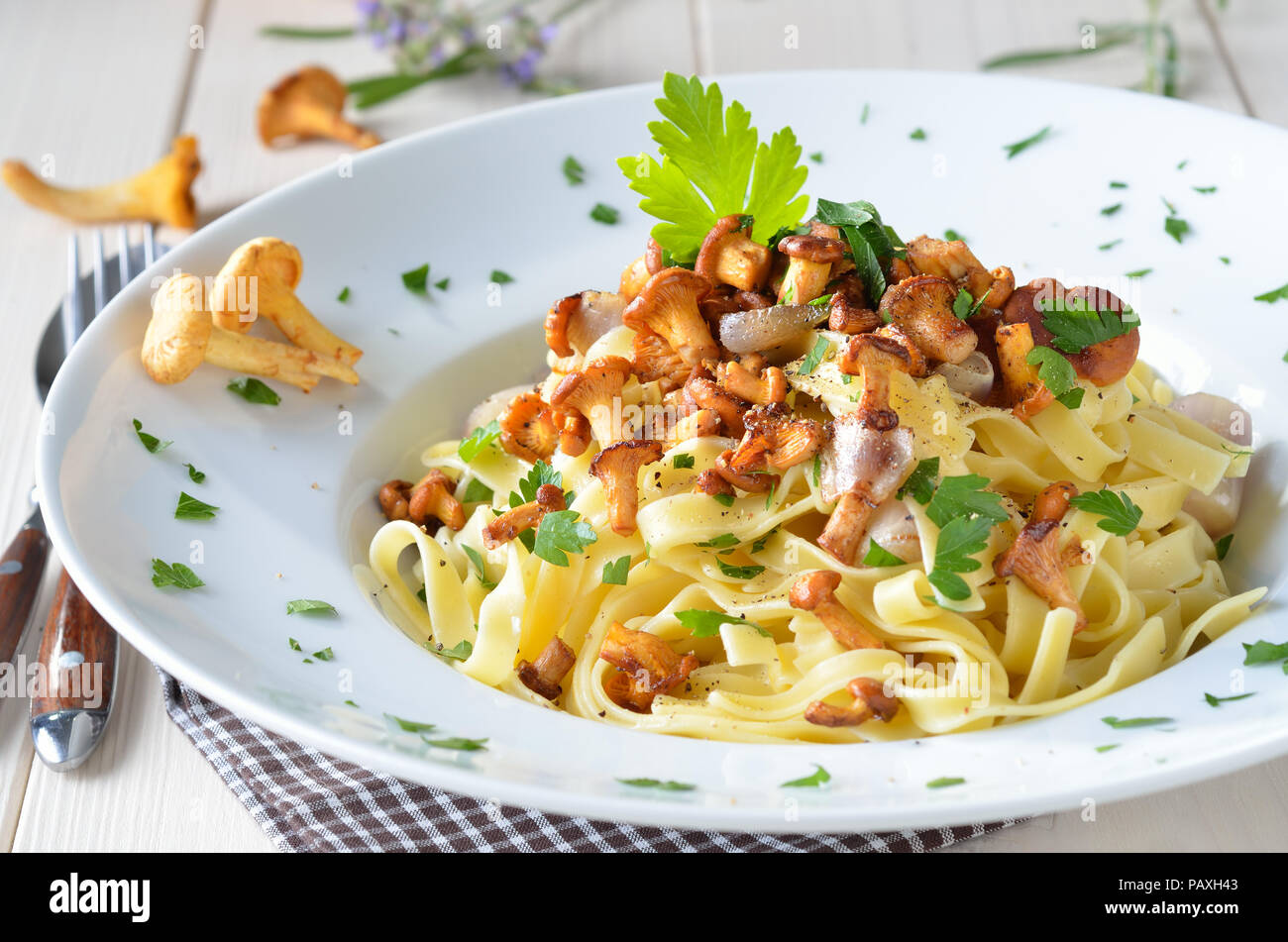 Italian tagliatelle with fried fresh chanterelles Stock Photo Alamy