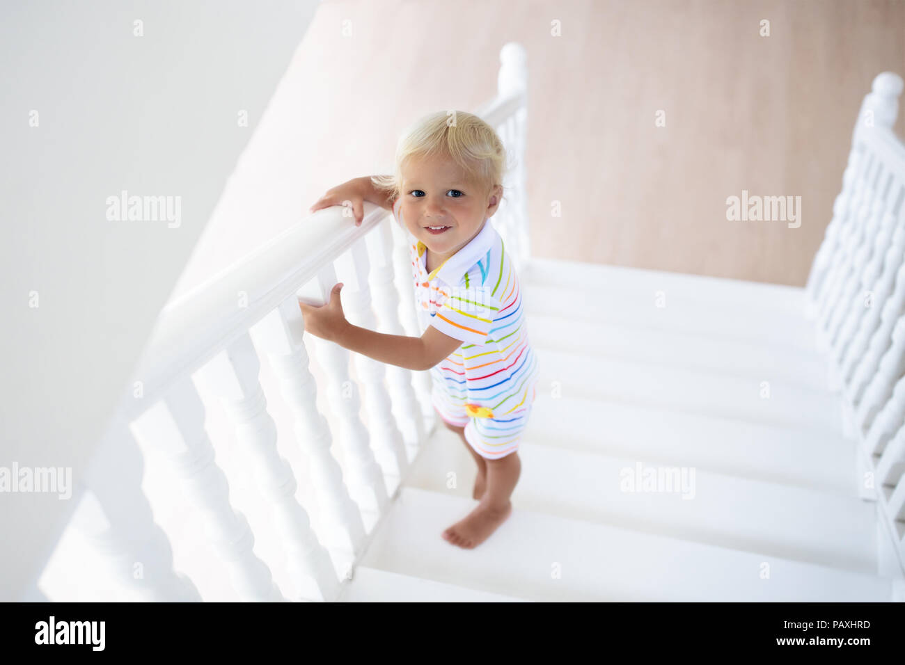 when do babies walk down stairs