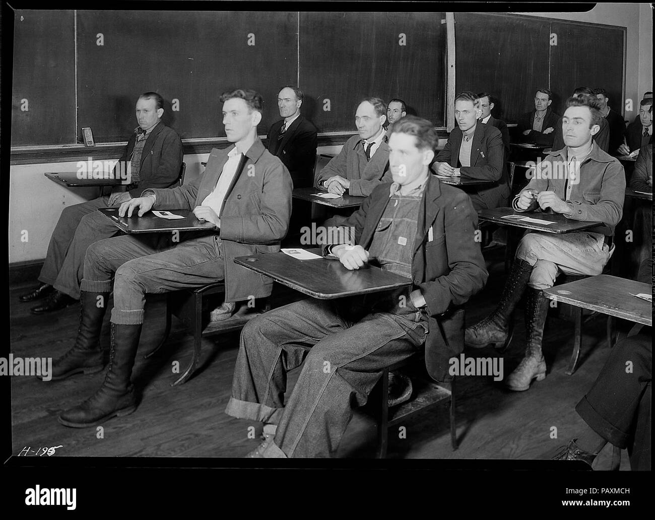 A View of a Group of Applicants at the High School Building, Clinton, Tennessee, Ready to Take the Examination for Skilled and Unskilled Laborers on TVA Projects Stock Photo