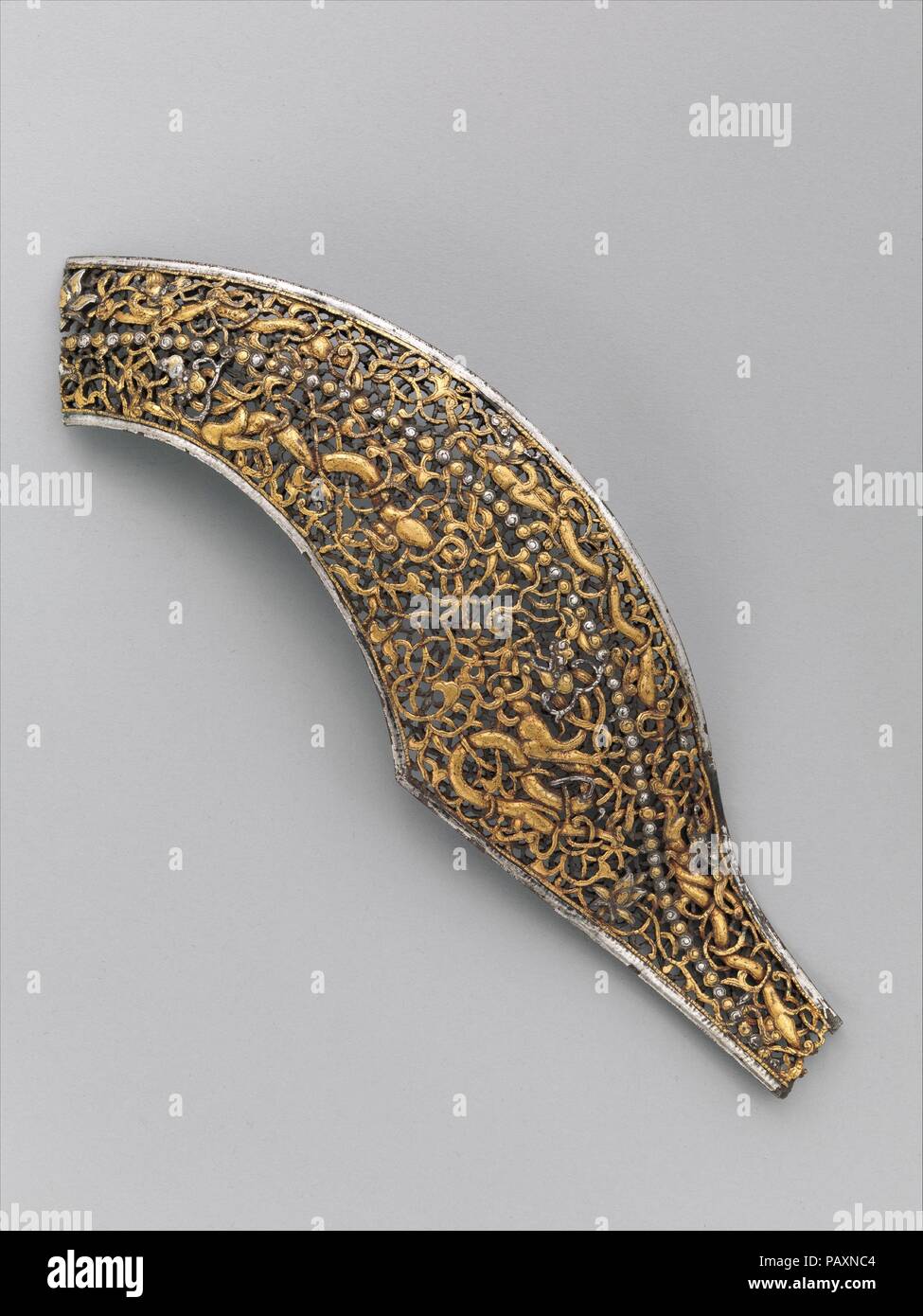 Right Half of a Cantle Plate from a Saddle. Culture: Tibetan or Chinese. Dimensions: H. 8 1/4 in. (21 cm); W. 6 1/4 in. (15.9 cm); Wt. 5 oz. (141.7 g). Date: 16th-18th century. Museum: Metropolitan Museum of Art, New York, USA. Stock Photo
