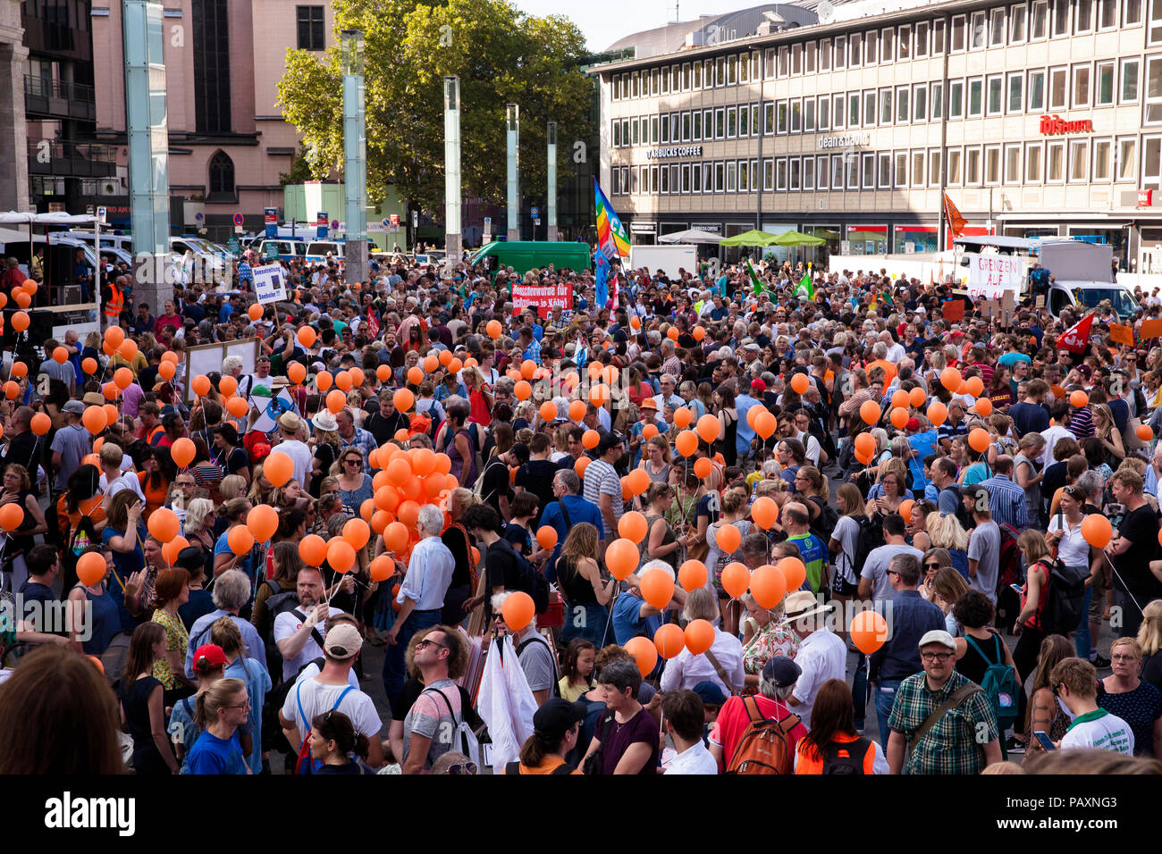 Several thousand people demonstrate on July 13, 2018 in Cologne for the rescue of refugees from the Mediterranean Sea. Under the motto 'Stop dying in  Stock Photo