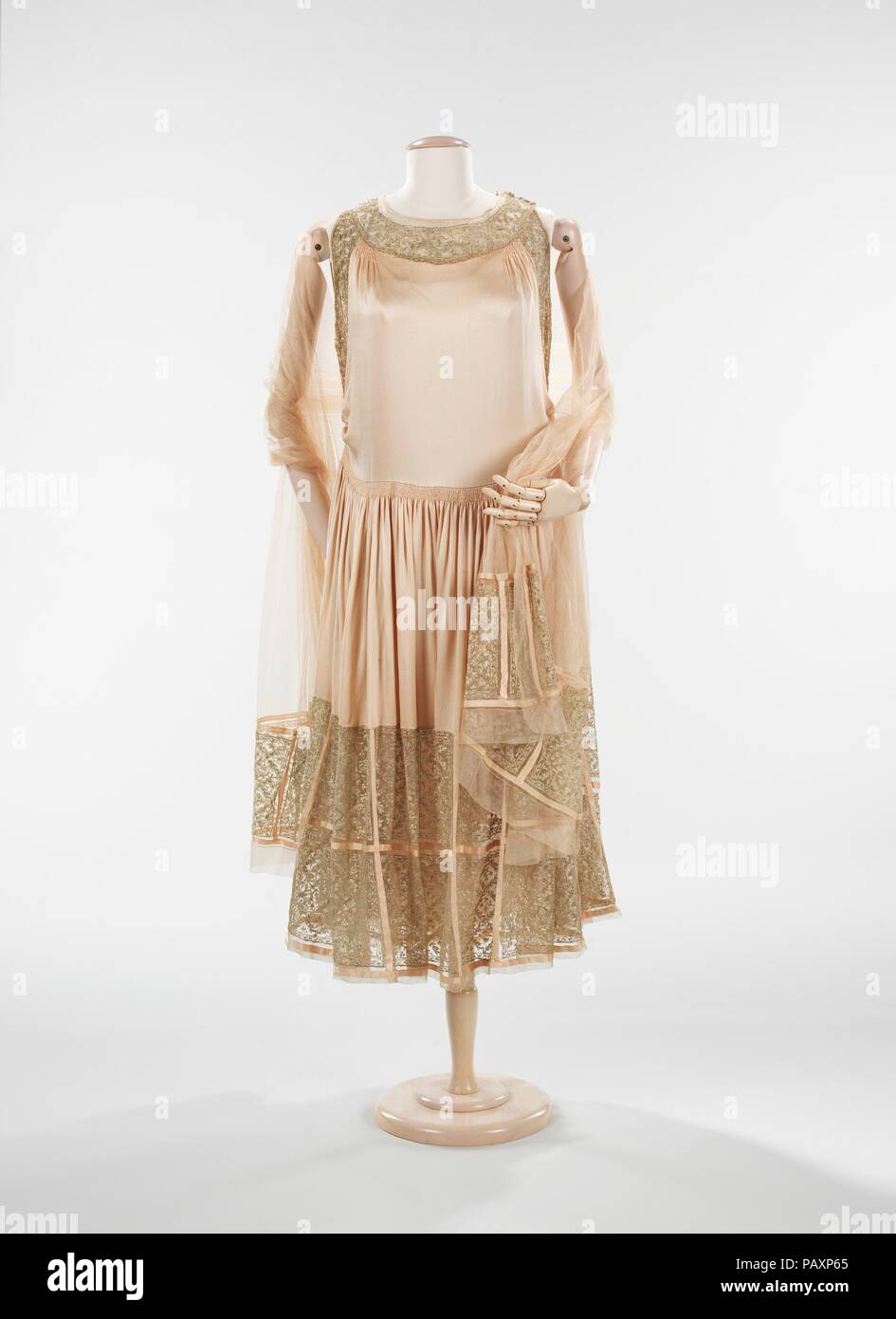 Evening dress. Culture: French. Design House: House of Lanvin (French, founded 1889). Designer: Jeanne Lanvin (French, 1867-1946). Date: fall/winter 1923-24. Jeanne Lanvin was apprenticed to a milliner and a dressmaker before opening Evening dress. Culture: French. Design House: House of Lanvin (French, founded 1889). Designer: Jeanne Lanvin (French, 1867-1946). Date: fall/winter 1923-24. Jeanne Lanvin was apprenticed to a milliner and a dressmaker before opening