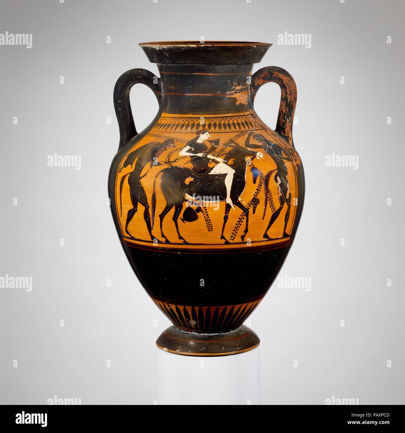 Terracotta amphora (jar). Culture: Greek, Attic. Dimensions: H. 15 1/8 in. (38.4 cm). Date: last quarter of 6th century B.C..  Obverse, banquet scene  Reverse, maenad riding a mule between two satyrs  Although the subject of each side of the amphora is different, the men and women, the satyrs and maenad, and the mule all are under the same influence. Museum: Metropolitan Museum of Art, New York, USA. Stock Photo