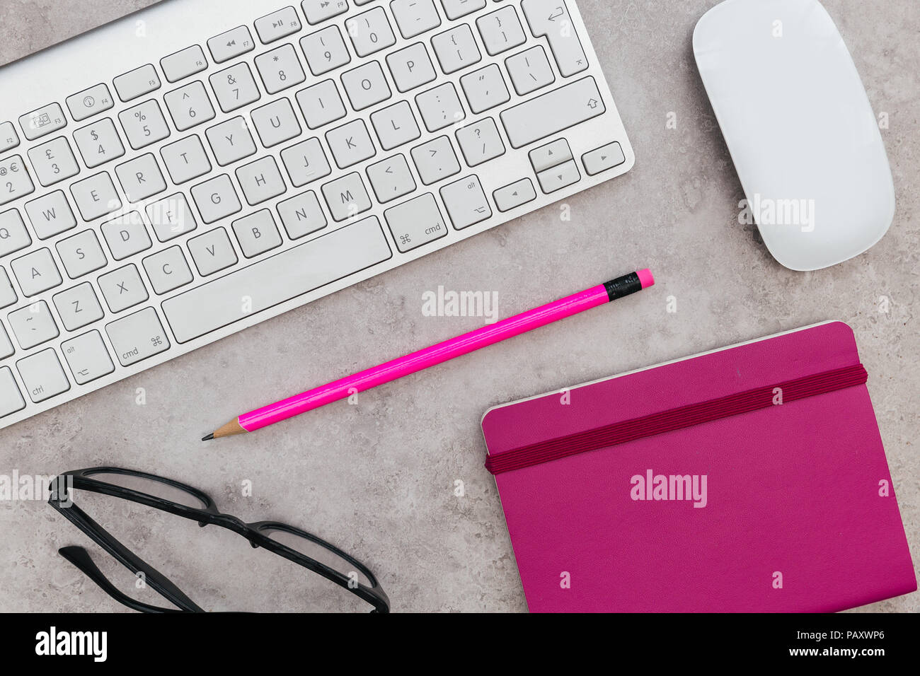 Computer keyboard notebook mouse on marble background Stock Photo