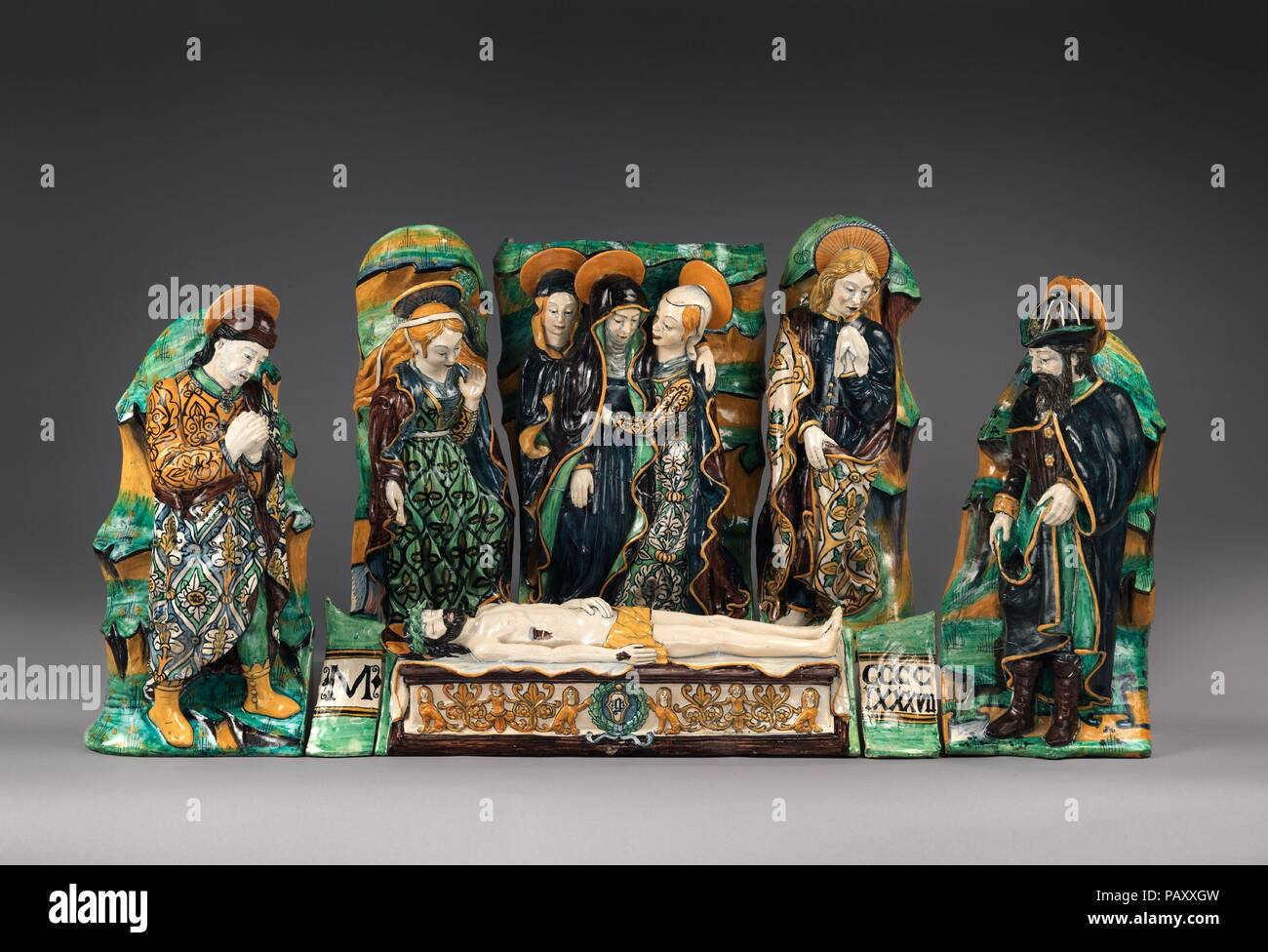 Sculptural group with The Lamentation Over the Dead Christ. Culture: Eastern Central Italian, Emilia-Romagna or the Marche. Dimensions: Overall: 29 1/2 x 64 x 12in. (74.9 x 162.6 x 30.5cm);  (a) confirmed: 9 1/8 × 28 5/8 × 6 3/4 in., 30.3 lb. (23.2 × 72.7 × 17.1 cm, 13.7 kg);  (b) confirmed: 27 3/4 in., 54.1 lb. (70.5 cm, 24.5 kg);  (c) confirmed: 28 5/8 in., 31.9 lb. (72.7 cm, 14.4 kg);  (d) confirmed: 29 1/4 in., 33.9 lb. (74.3 cm, 15.4 kg);  (e) confirmed: 27 1/2 in., 32.9 lb. (69.9 cm, 14.9 kg);  (f) confirmed: 28 5/8 in., 36 lb. (72.7 cm, 16.4 kg);  (g) confirmed: 8 5/8 in. (21.9 cm)  (h) Stock Photo