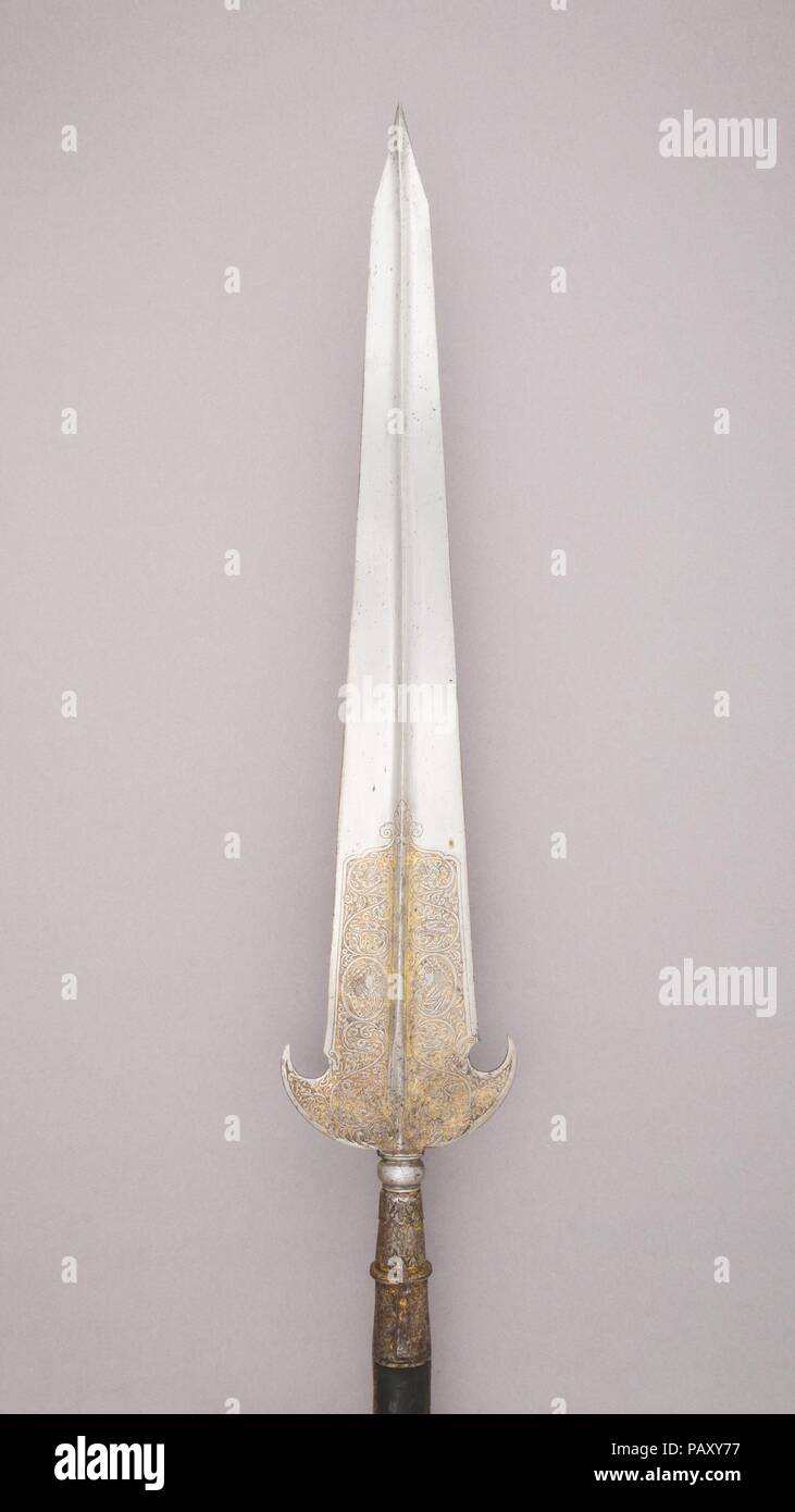 Partisan. Culture: French. Dimensions: L. 98 1/4 in. (249.6 cm); L. of head 28 9/16 in. (72.5 cm); W. 5 7/16 in. (13.8 cm); Wt. 5 lbs. 12.1 oz. (2611 g). Date: ca. 1625. Museum: Metropolitan Museum of Art, New York, USA. Stock Photo