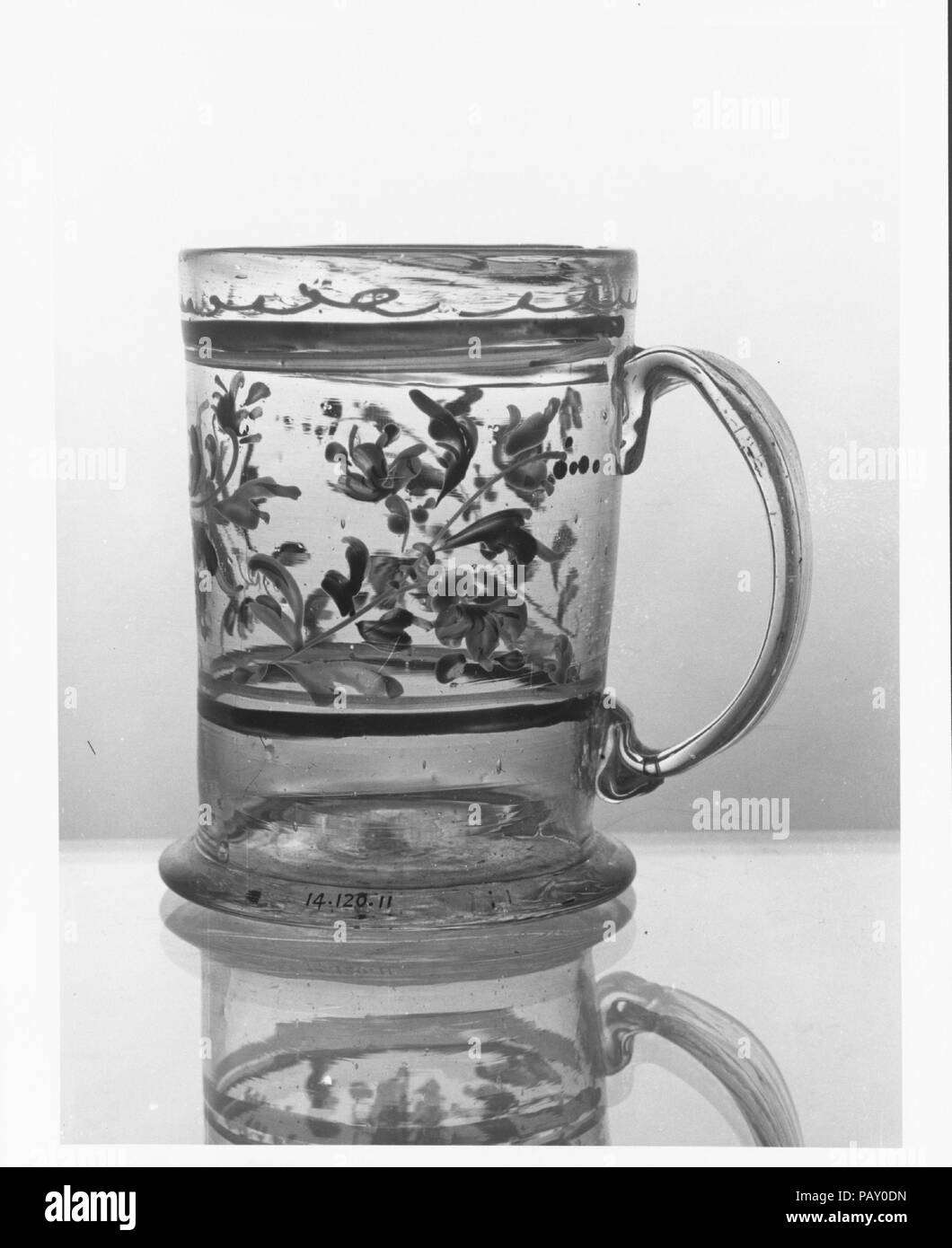 Thick glass mugs stacked. Drinking water storage containers. Light  background Stock Photo - Alamy