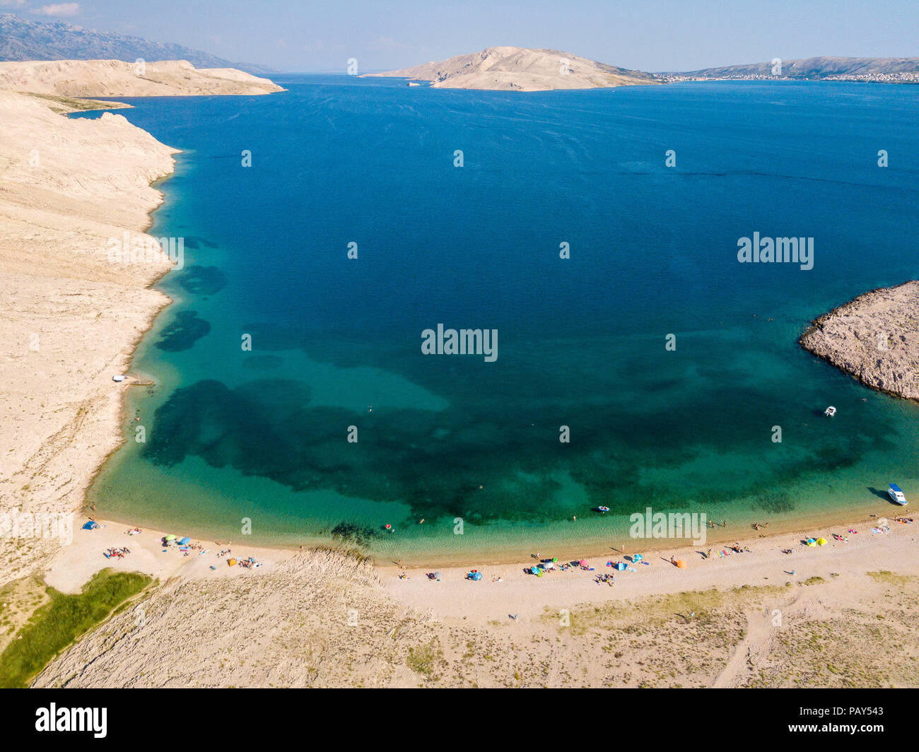 Aerial view of Rucica beach on Pag island, Metajna, Croatia. Seabed and beach seen from above. Promontories and cliffs of Croatian coasts. Holiday Stock Photo