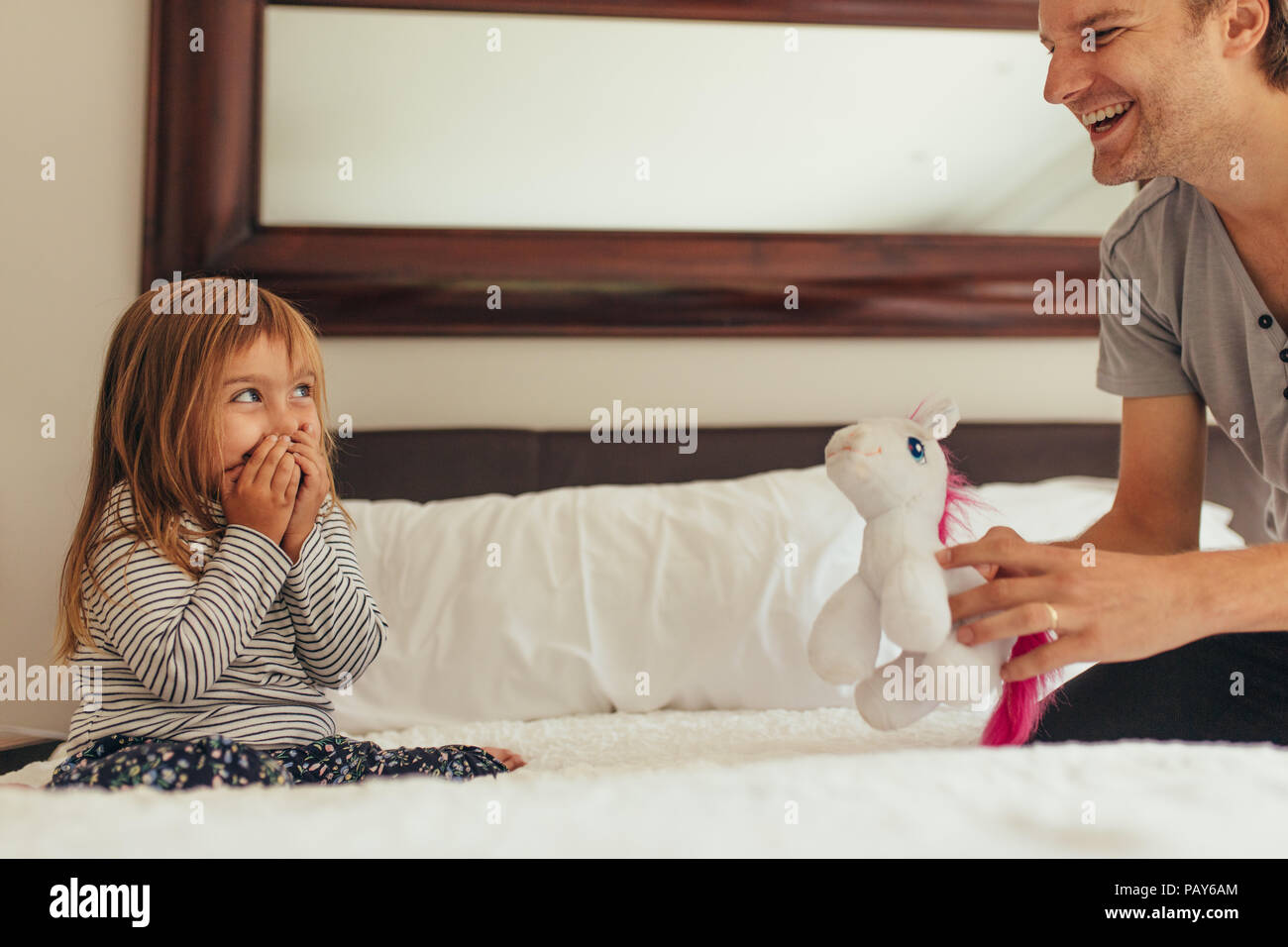 little girl playing with dad pthc A little girl playing with dad hi-res stock photography and ...