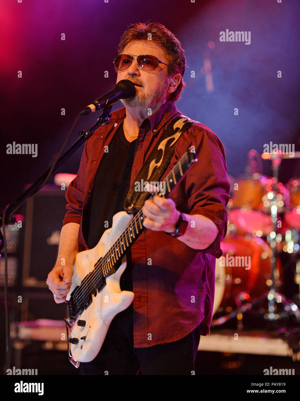 POMPANO BEACH, FL - AUGUST 15: Eric Bloom, Jules Radino and Donald 'Buck Dharma' Roeser of Blue Oyster Cult perform at the Pompano Beach Ampitheatre on August 15, 2015 in Pompano Beach Florida.   People:  Donald Roeser, Buck Dharma Stock Photo