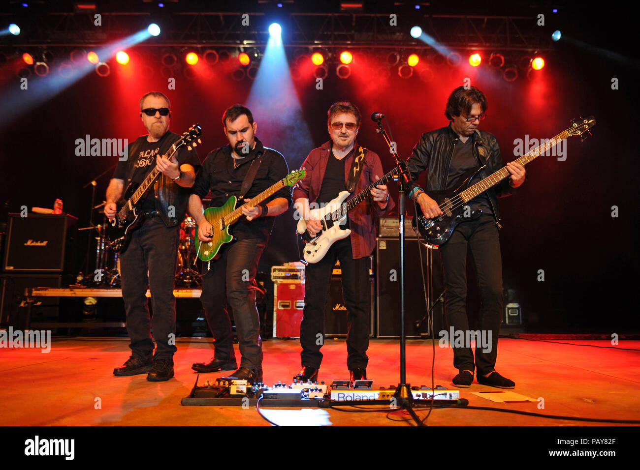 POMPANO BEACH, FL - AUGUST 15: Eric Bloom, Jules Radino and Donald 'Buck Dharma' Roeser of Blue Oyster Cult perform at the Pompano Beach Ampitheatre on August 15, 2015 in Pompano Beach Florida.   People:  Eric Bloom, Richie Castellano, Donald Roeser, Kasim Sulton Stock Photo