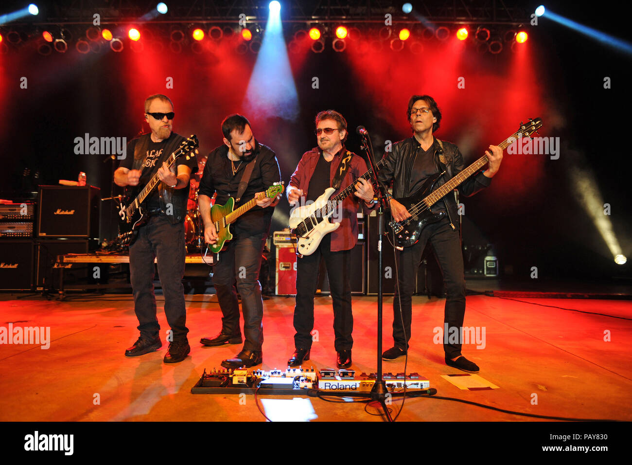 POMPANO BEACH, FL - AUGUST 15: Eric Bloom, Jules Radino and Donald 'Buck Dharma' Roeser of Blue Oyster Cult perform at the Pompano Beach Ampitheatre on August 15, 2015 in Pompano Beach Florida.   People:  Eric Bloom, Richie Castellano, Donald Roeser, Kasim Sulton Stock Photo