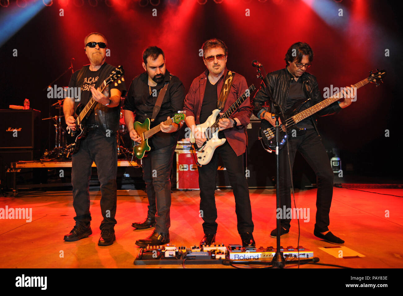 POMPANO BEACH, FL - AUGUST 15: Eric Bloom, Jules Radino and Donald 'Buck Dharma' Roeser of Blue Oyster Cult perform at the Pompano Beach Ampitheatre on August 15, 2015 in Pompano Beach Florida.   People:  Eric Bloom, Richie Castellano, Donald Roeser, Kasim Sulton Stock Photo