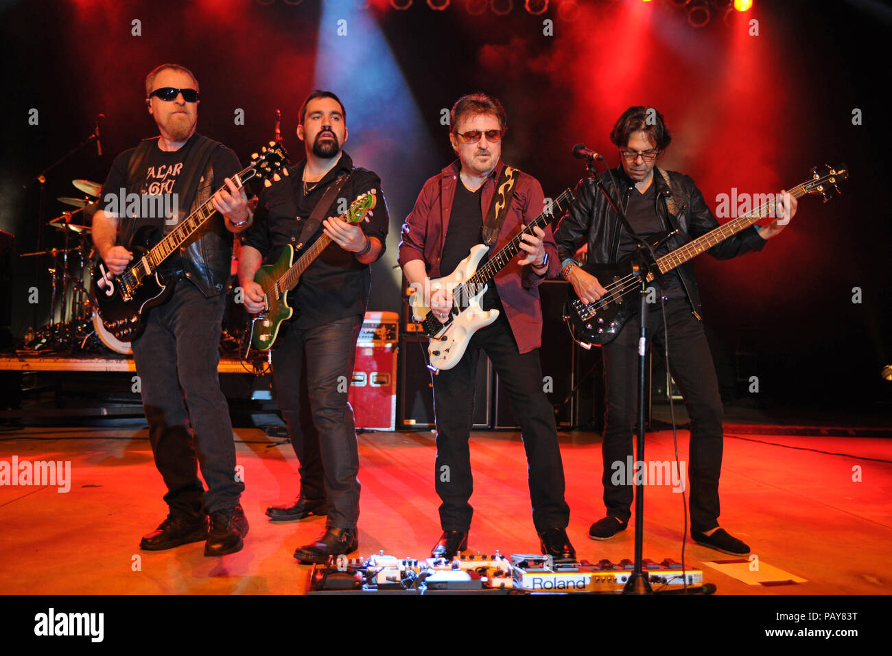 POMPANO BEACH, FL - AUGUST 15: Eric Bloom, Jules Radino and Donald 'Buck Dharma' Roeser of Blue Oyster Cult perform at the Pompano Beach Ampitheatre on August 15, 2015 in Pompano Beach Florida.   People:  Eric Bloom, Richie Castellano, Donald Roeser, Kasim Sulton Stock Photo