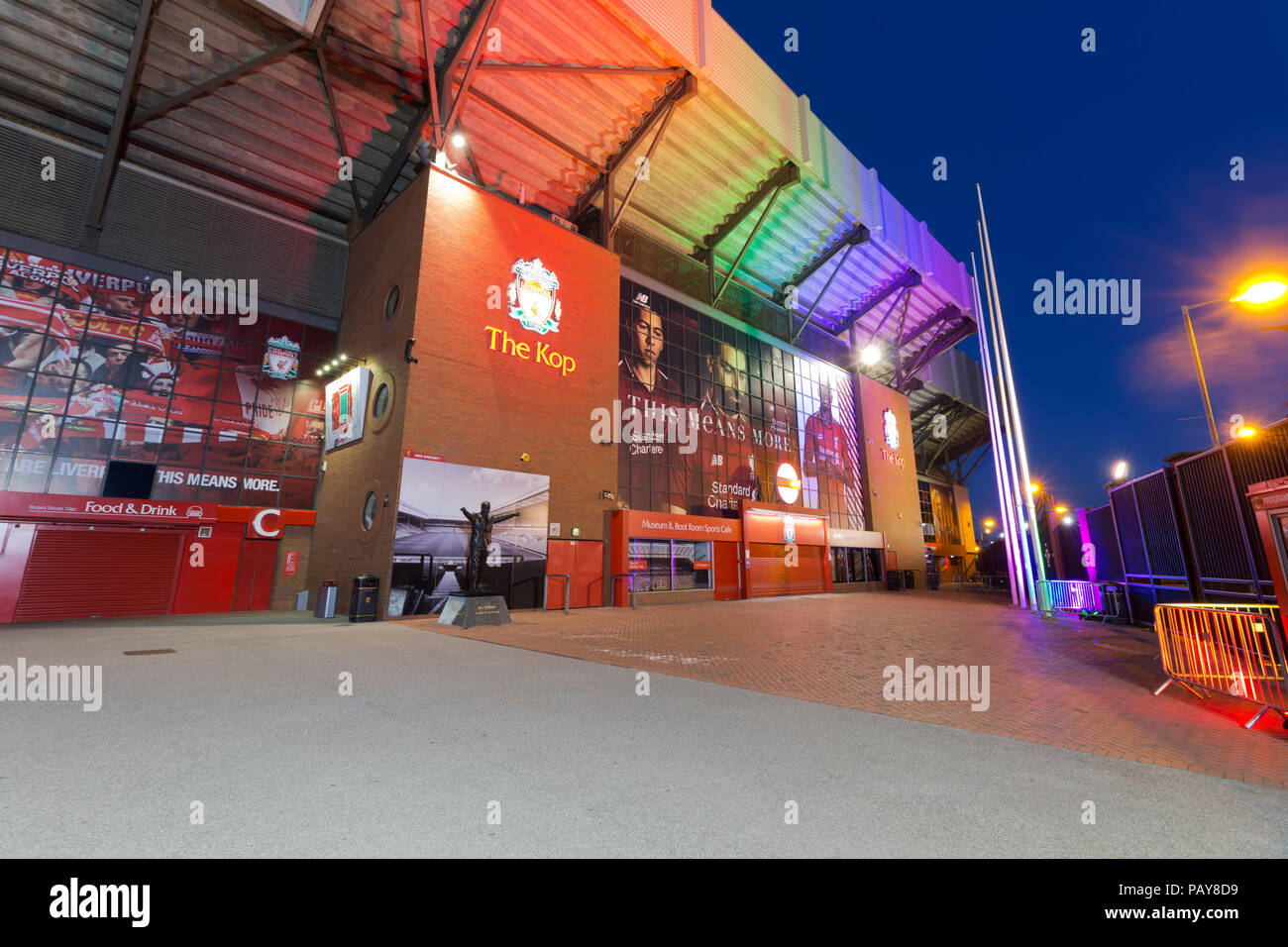 Anfield, home of Liverpool Football Club lit up in the colours of the LGBT as the City shines a light on diversity ahead of the Liverpool Pride Week. Stock Photo