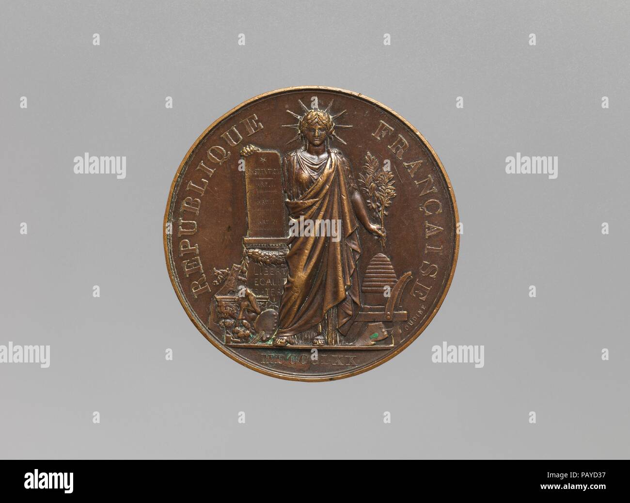 Medal Awarded to French Civilian Pigeon-Keepers (Colombiers civils). Artist: Medalist: Eugène-André Oudiné (French, Paris 1810-1887 Paris). Culture: French. Dimensions: Diameter (confirmed): 2 11/16 in. (6.8 cm). Date: 1870.  During the Franco-Prussian War of 1870-71, Paris came under siege by German forces. In order to communicate with the outside world, new postal technologies were devised, including the use of homing pigeons to carry messages in micro-film to and from the capital city. This struck copper medal was awarded to civilian pigeon-keepers ('colombiers civils') by the French Minist Stock Photo