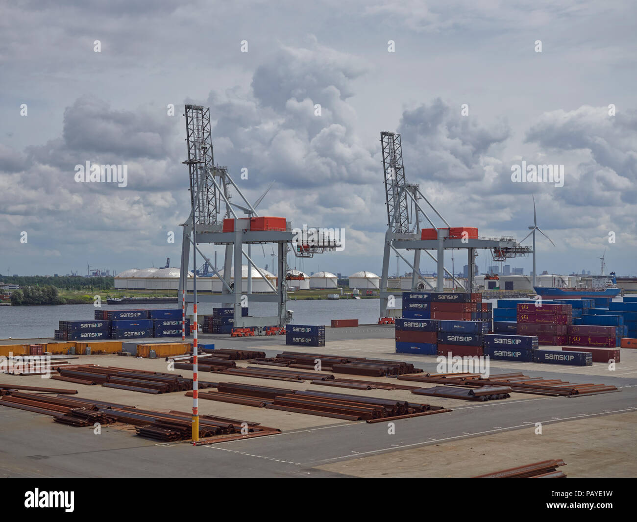 Two Large Container Cranes awaiting loading operations at the Container Terminal in Den Haag, Amsterdam, The Netherlands. Stock Photo