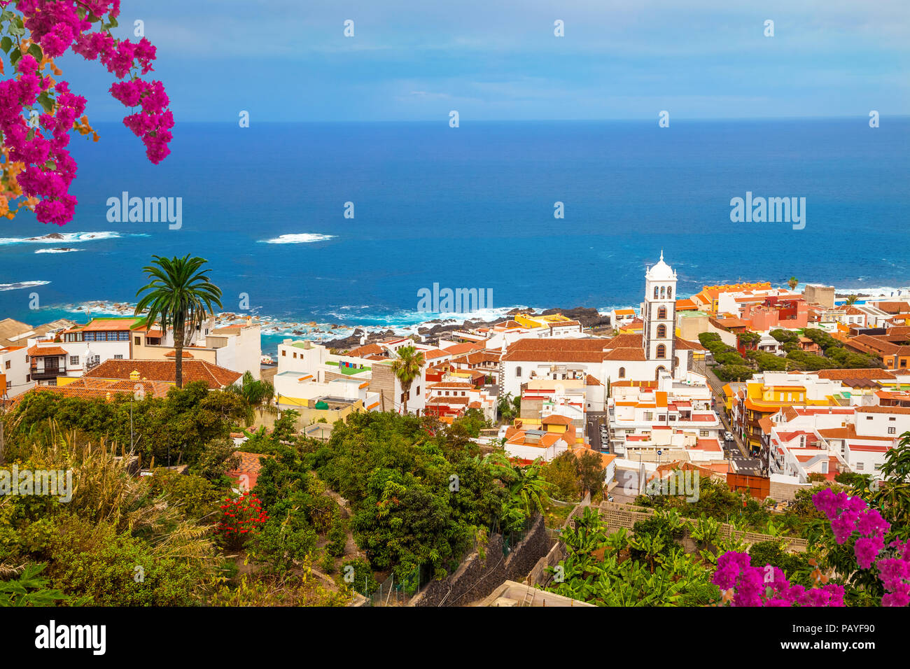 Aerial view over Garachico cityscape with traditional house architecture and the famous Santa Ana church Stock Photo