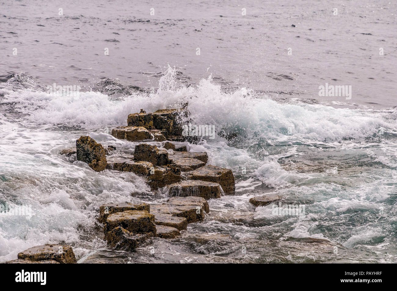 The island of Staffa and Fingals cave. Argyll Scotland. Stock Photo