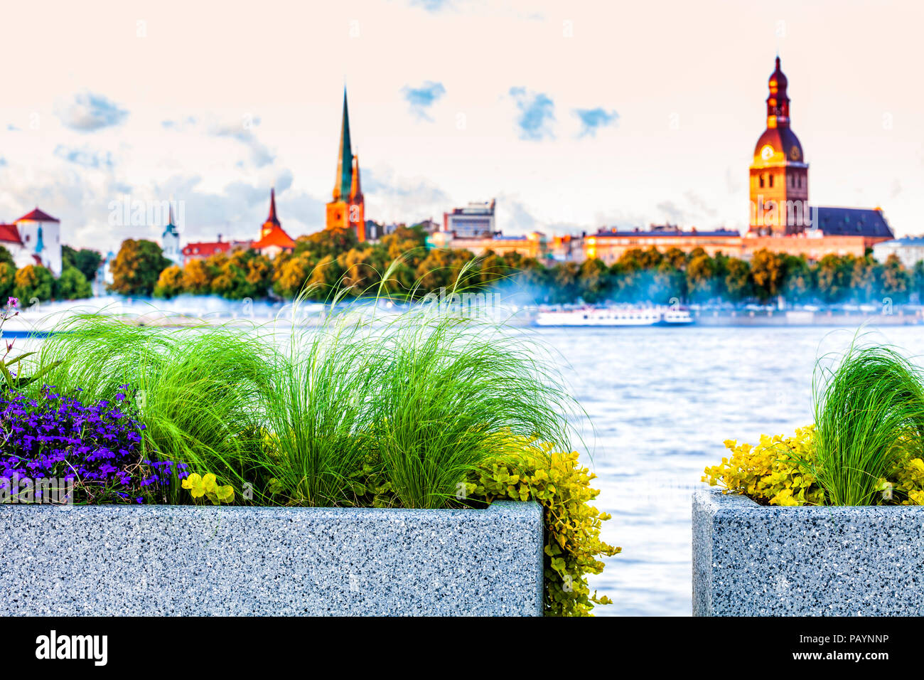 Urban flower pots with Riga old town skyline Stock Photo Alamy