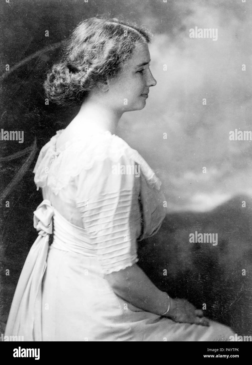 Helen Keller, half-length portrait, seated, right profile, circa 1909 Stock Photo