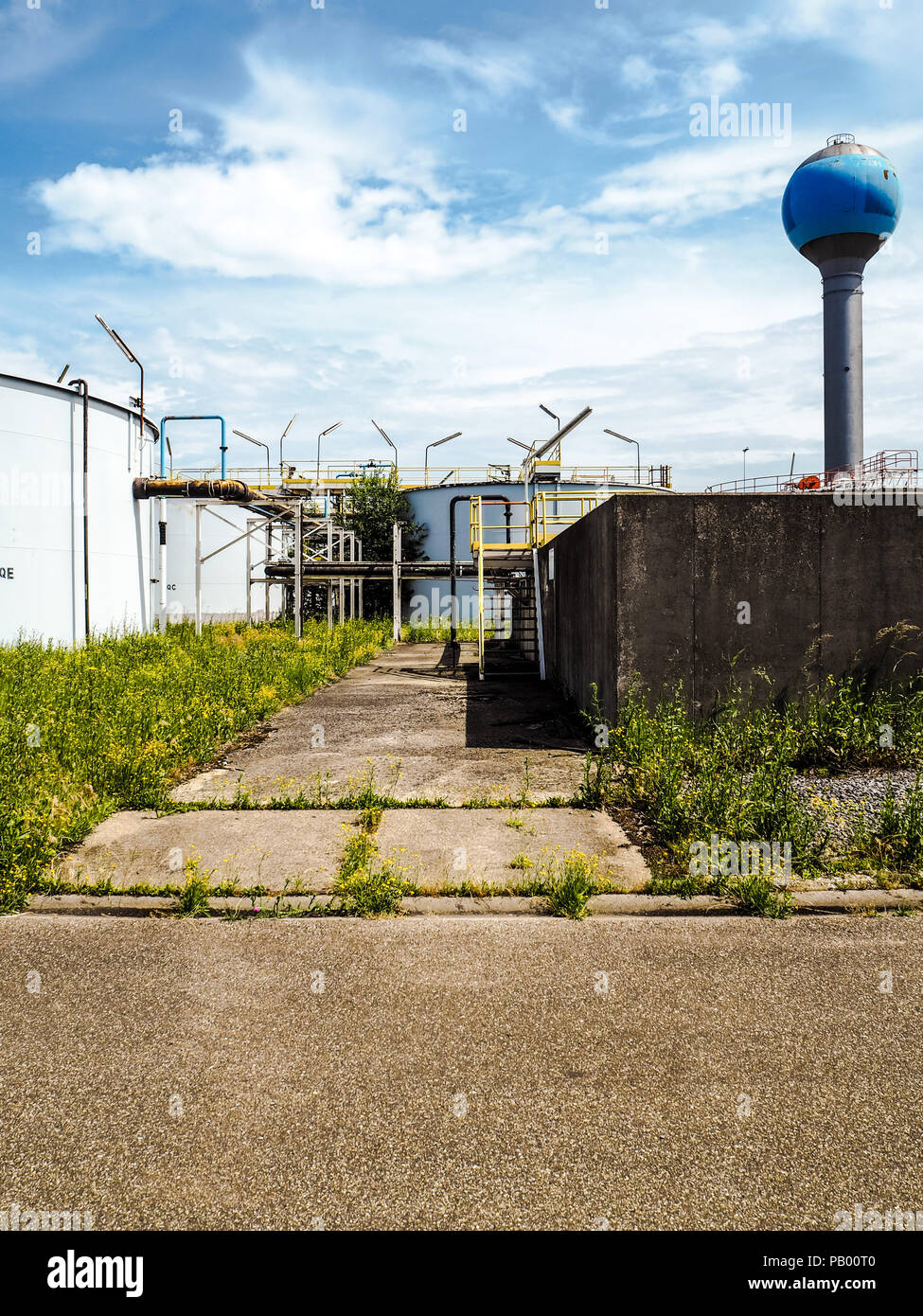Old weathered water treatment facility of a large industrial factory Stock Photo