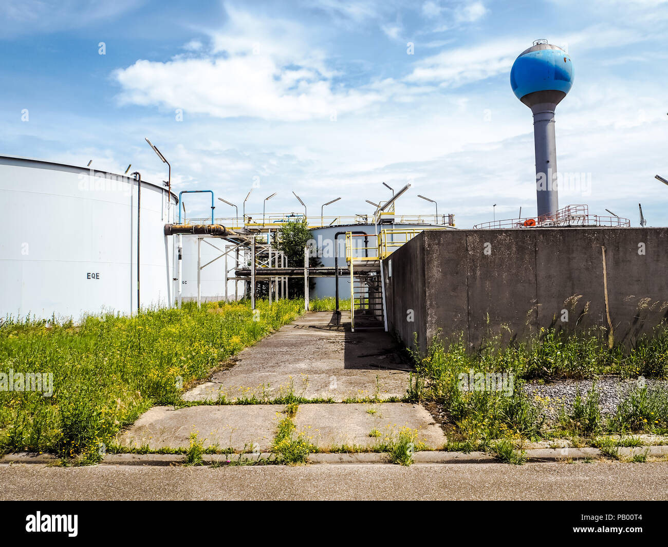 Old weathered water treatment facility of a large industrial factory Stock Photo