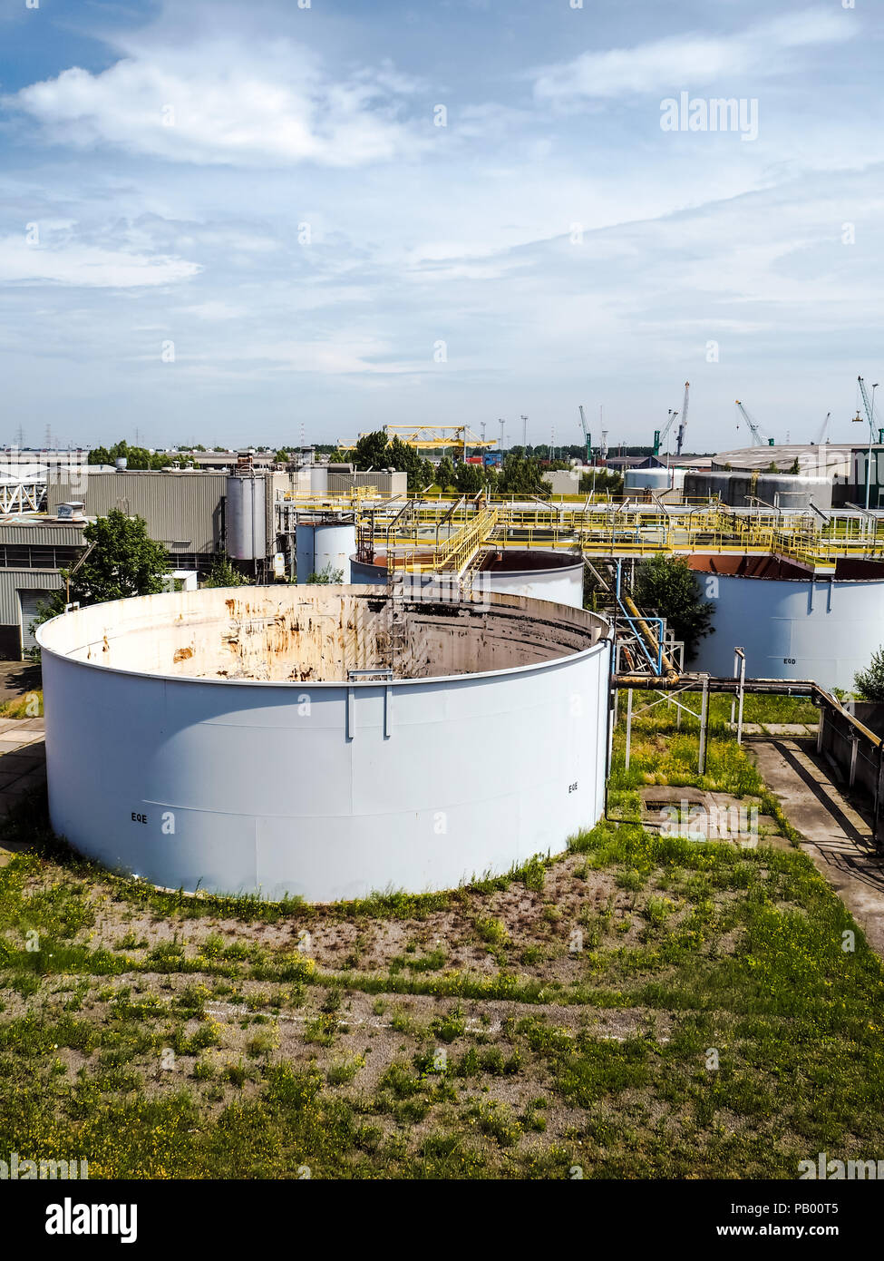 Old weathered water treatment facility of a large closed industrial factory Stock Photo