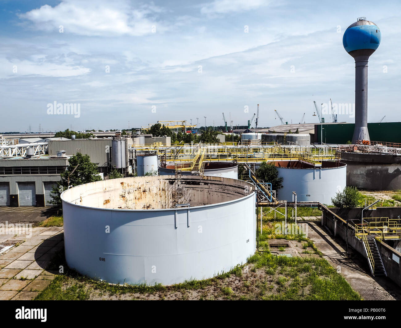 Old weathered water treatment facility of a large closed industrial factory Stock Photo