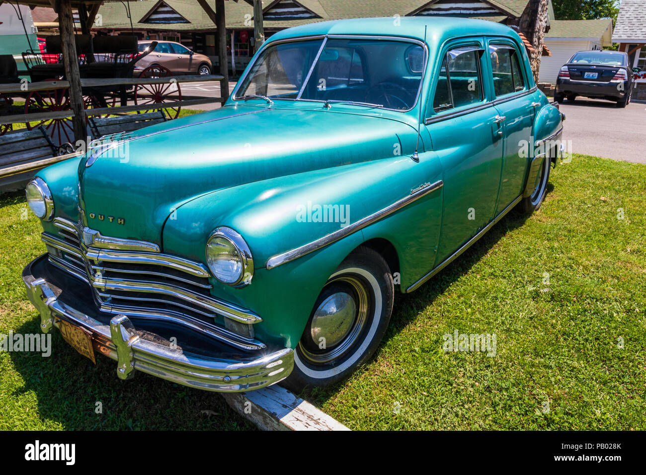 AURORA, KY, USA-30 JUNE 18: A seemingly original turquoise 1949 Plymouth sets  in front of a gift shop in the Land Between the Lakes town. Stock Photo