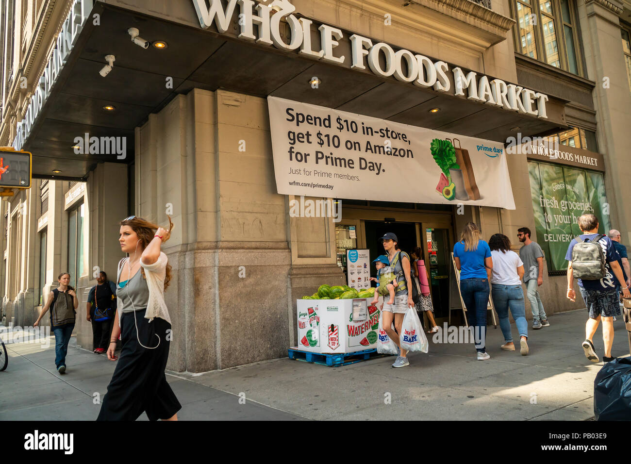 The Whole Foods Market in the Chelsea neighborhood of New York advertises Amazon's offer to Prime members of $10 off on Prime Day when you spend $10 in store. Amazon's self-proclaimed holiday starts on July 16. (Â© Richard B. Levine) Stock Photo