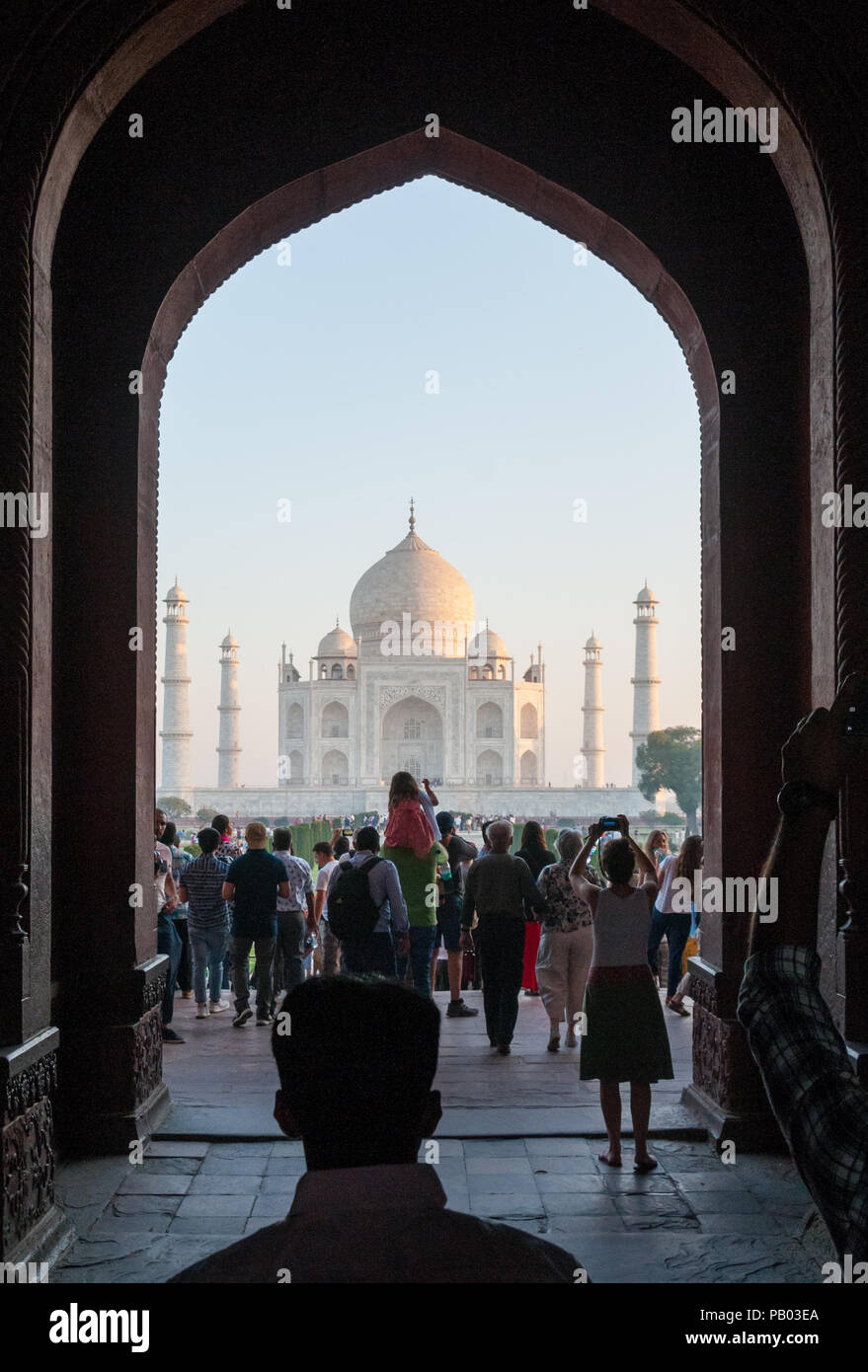 Entrance gate to Taj Mahal with tourists Stock Photo Alamy