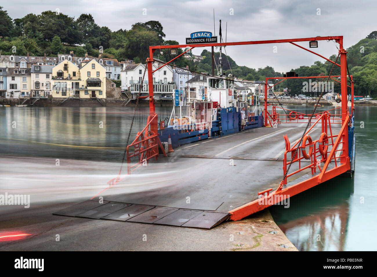 The ferry from Bodinnick to Fowey is family run and offers an easy crossing for both vehicles and foot passengers . Stock Photo
