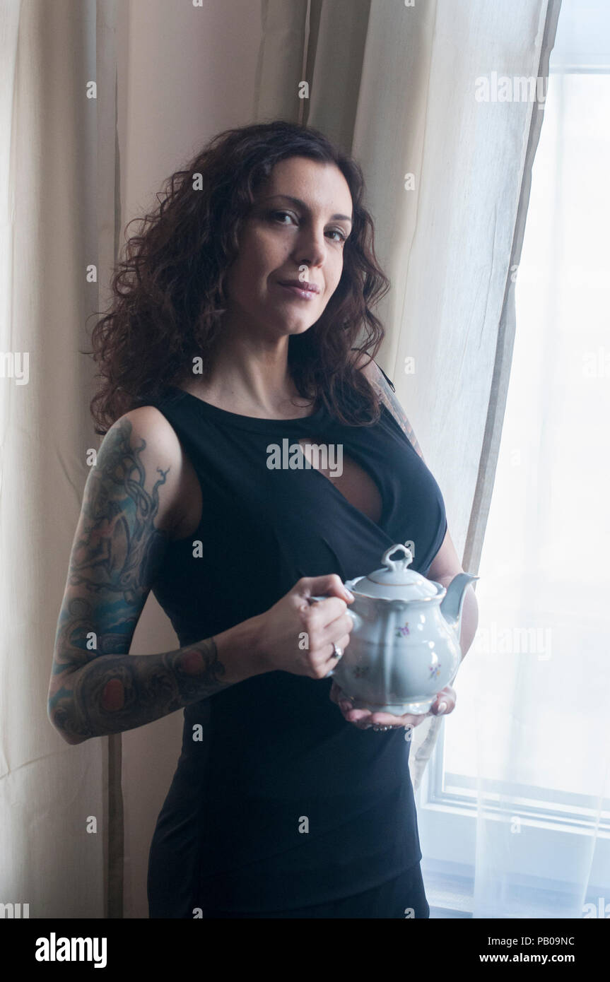 Mature woman tattoo hi-res stock photography and images - Alamy