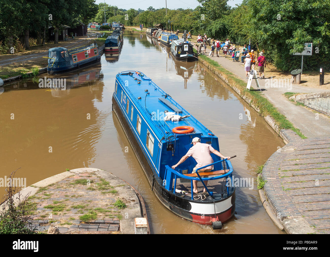A Narrow Boat Navigating the Shropshire Union Canal near Nantwich Marina in Cheshire England United Kingdom UK Stock Photo