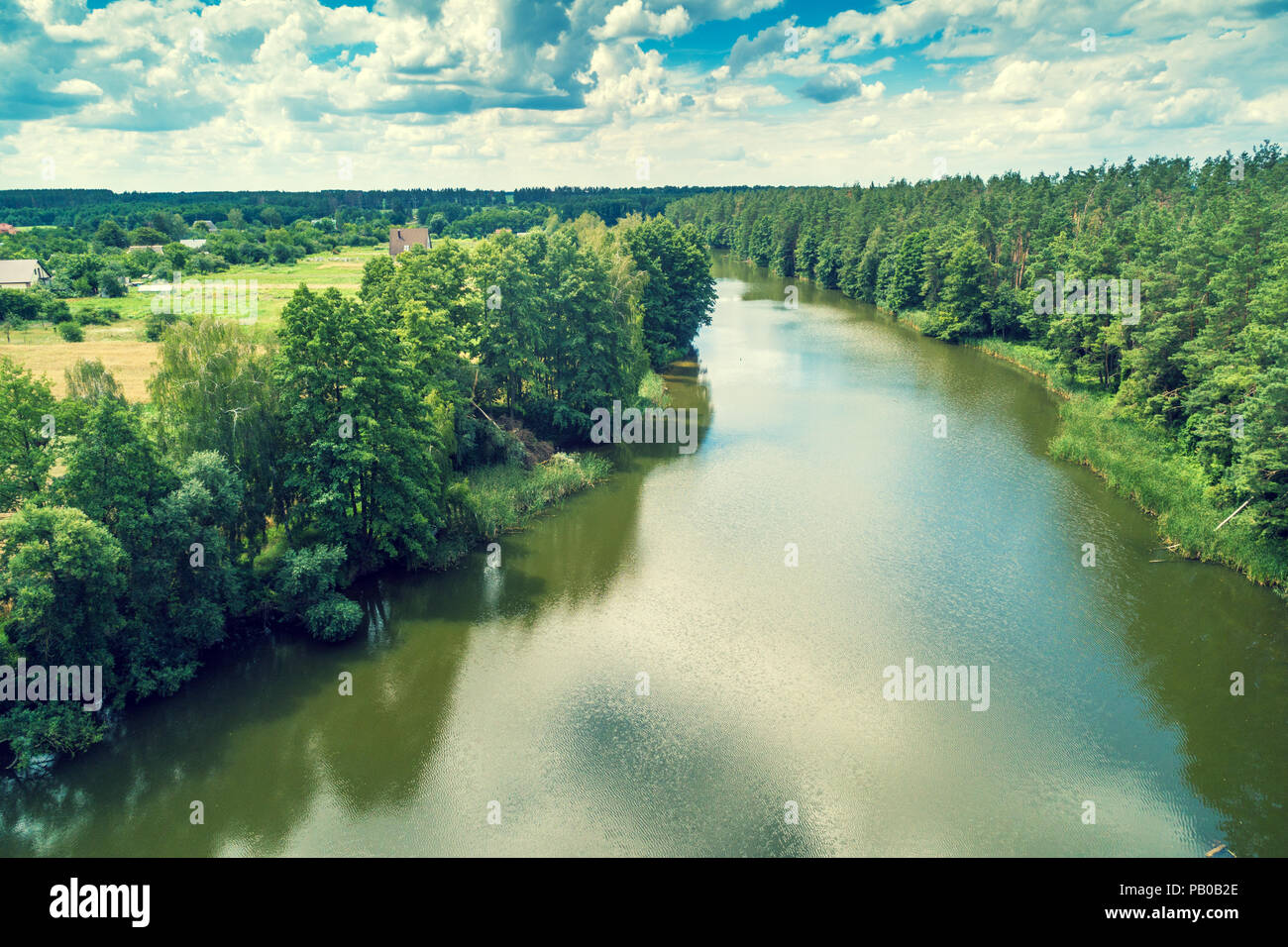 Aerial view of the countryside and river. Forest along the river Stock