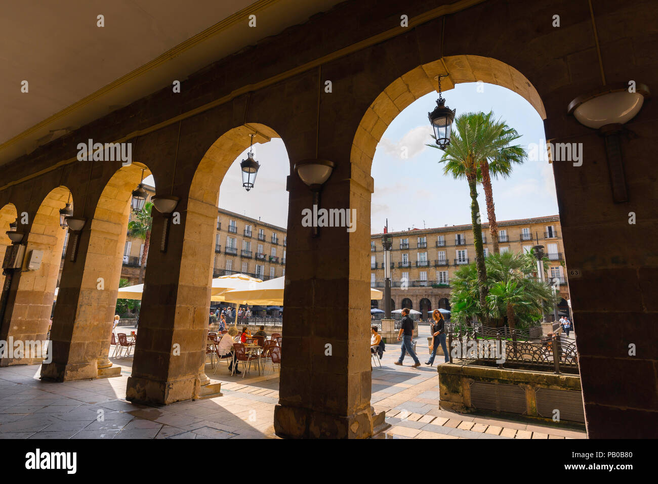 Bilbao Plaza Nueva, view of the square from within the colonnade that surrounds the Plaza Nueva in the Old Town (Casco Viejo) area of Bilbao, Spain. Stock Photo