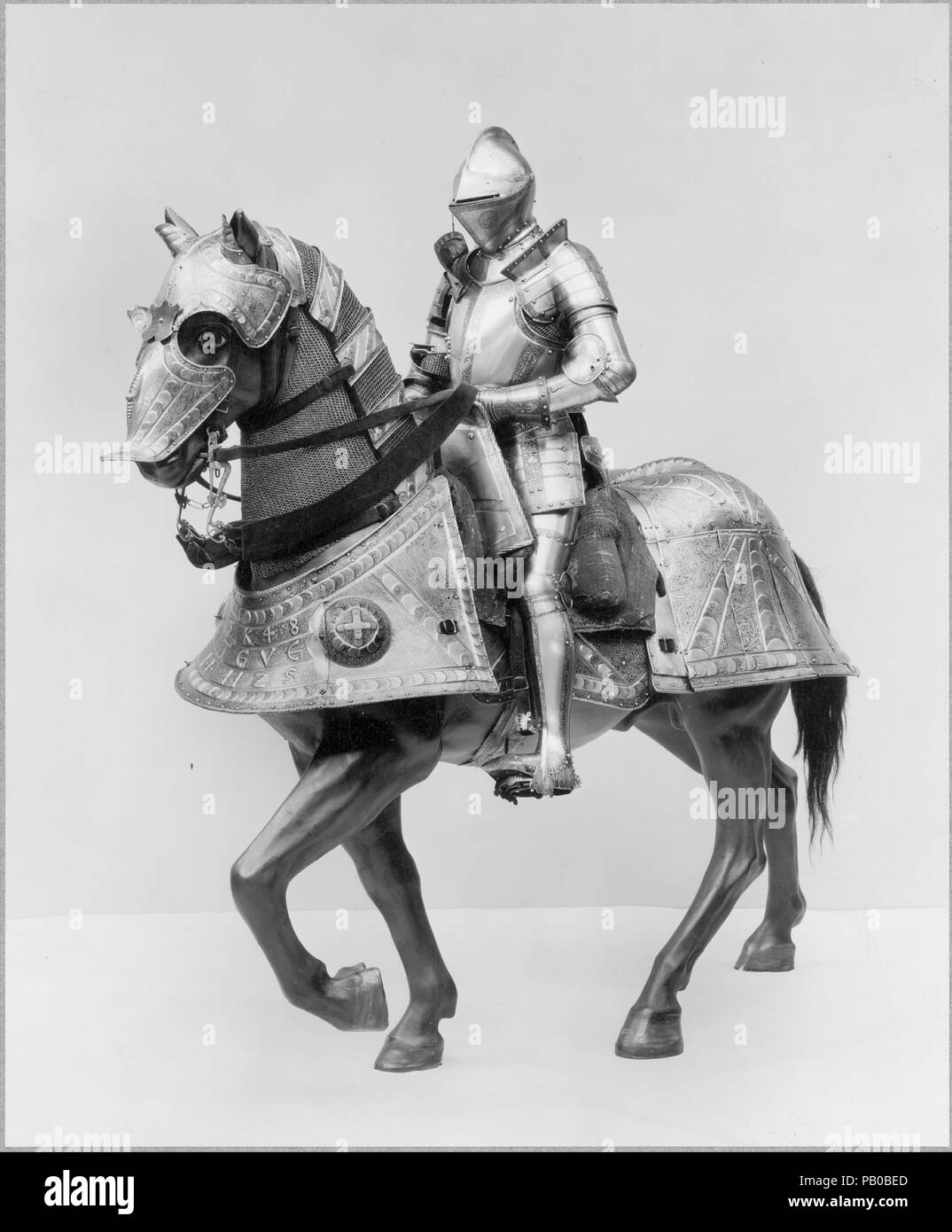 Horse Armor Made for Johann Ernst, Duke of Saxony-Coburg (1521-1553). Armorer: Kunz Lochner (German, Nuremberg, 1510-1567). Culture: German, Nuremberg. Dimensions: Wt. including saddle 92 lb. (41.73 kg); bit: H. 6 in (15.2 cm); W. 11 in (27.9 cm). Date: dated 1548.  Kunz Lochner was one of the few Nuremberg armorers of the mid-sixteenth century to achieve an international reputation. His patrons included the Holy Roman Emperor, the dukes of Saxony, and the king of Poland. This horse armor bears only the Nuremberg mark but can be attributed to Lochner on stylistic grounds. The elaborately embos Stock Photo
