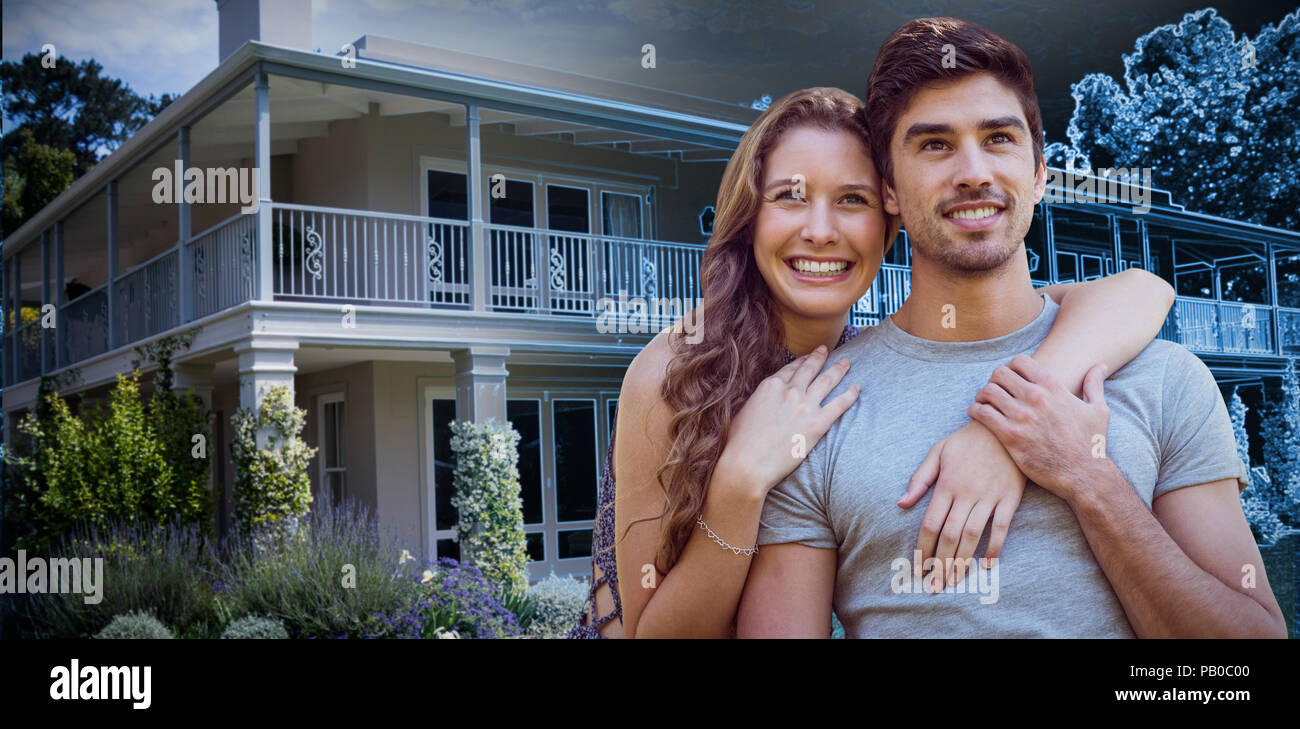 Composite image of young couple embracing Stock Photo - Alamy