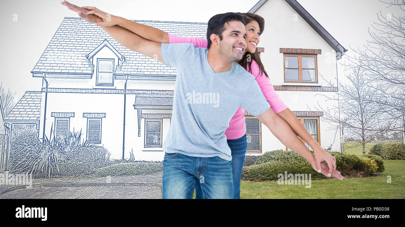 Composite image of happy man giving his girlfriend piggy back Stock Photo