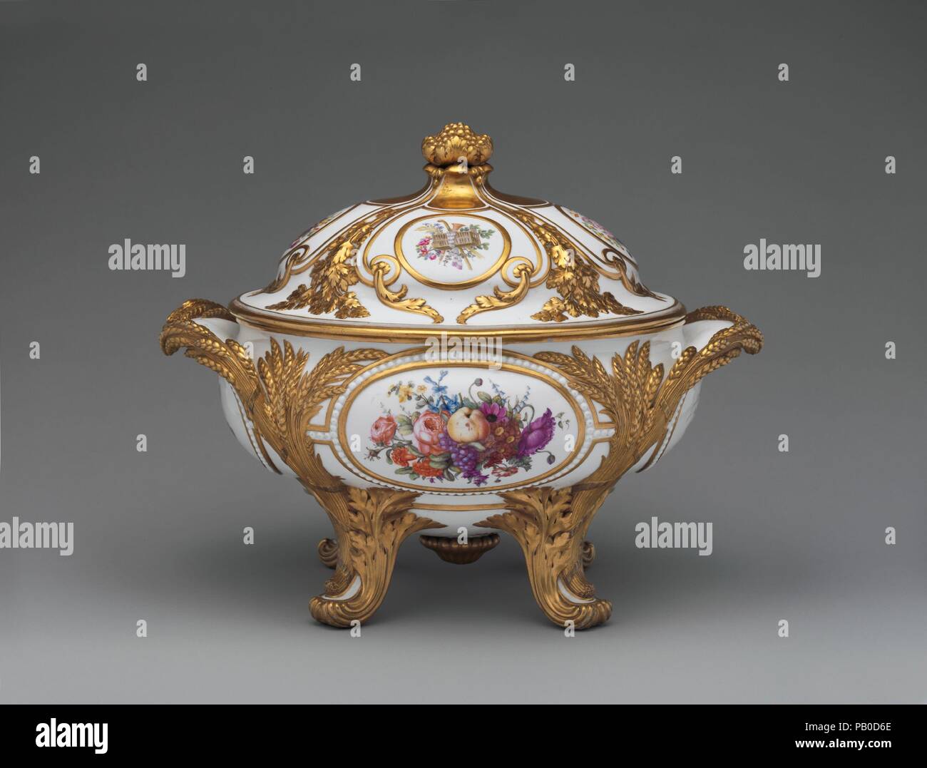 Tureen with cover. Culture: French, Sèvres. Decorator: François Antoine Pfeiffer (French, active 1771-1800); Nicolas Sinsson (French, active 1773-1795); Gilded by Henri-François Vincent (active 1753-1806). Dimensions: Overall (confirmed): 13 1/16 × 16 3/8 × 11 5/8 in. (33.2 × 41.6 × 29.5 cm). Factory: Sèvres Manufactory (French, 1740-present). Date: ca. 1777-85. Museum: Metropolitan Museum of Art, New York, USA. Stock Photo