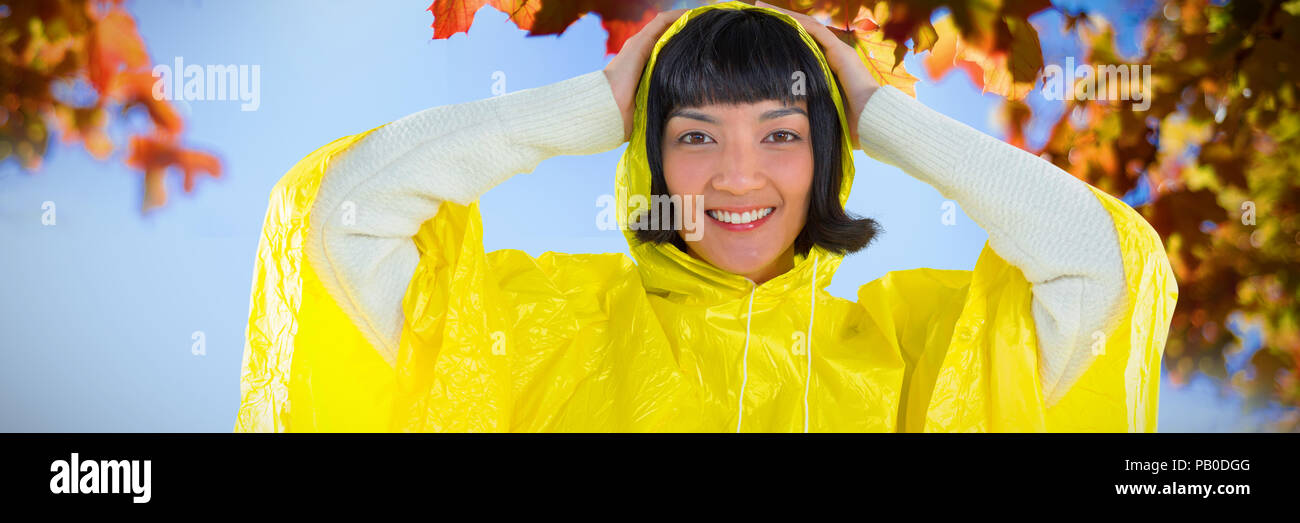 Woman wearing raincoat hi-res stock photography and images - Alamy