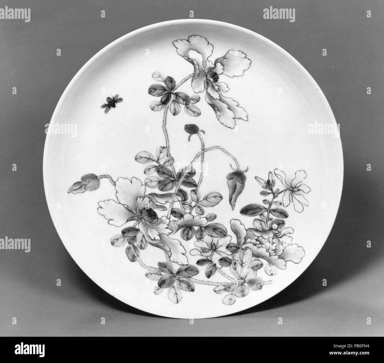 Dish. Culture: China. Dimensions: Diam. 8 1/16 in. (20.3 cm). Date: ca. 1730-50. Museum: Metropolitan Museum of Art, New York, USA. Stock Photo