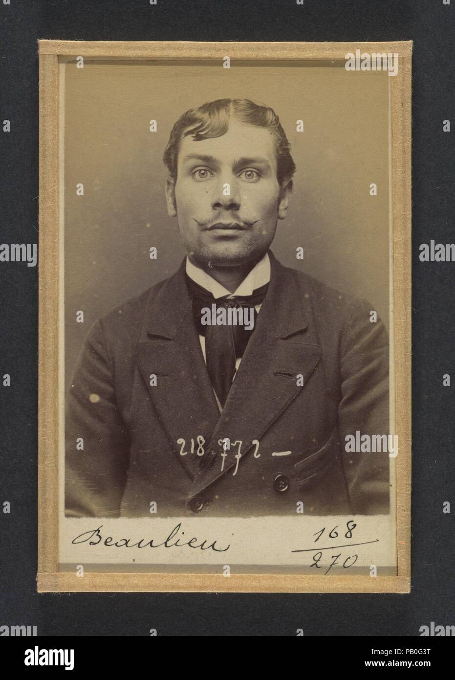 Beaulieu. Henri, Félix, Camille. 23 ans, né le 30/11/70 à Paris Ve. Comptable. Anarchiste. 23/5/94. Artist: Alphonse Bertillon (French, 1853-1914). Dimensions: 10.5 x 7 x 0.5 cm (4 1/8 x 2 3/4 x 3/16 in.) each. Date: 1894.  Born into a distinguished family of scientists and statisticians, Bertillon began his career as a clerk in the Identification Bureau of the Paris Prefecture of Police in 1879. Tasked with maintaining reliable police records of offenders, he developed the first modern system of criminal identification. The system, which became known as Bertillonage, had three components: ant Stock Photo