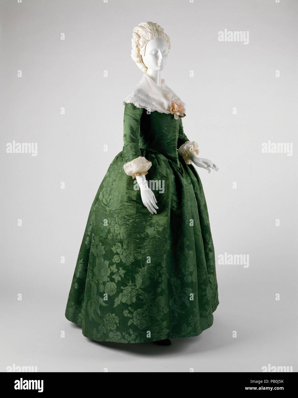 Ensemble. Culture: American. Date: ca. 1775. This dress is considerably  less gaudy than continental and English clothing of the period. Yet, it is  not lacking in sumptuousness. Rather, the green Spitalfields damask