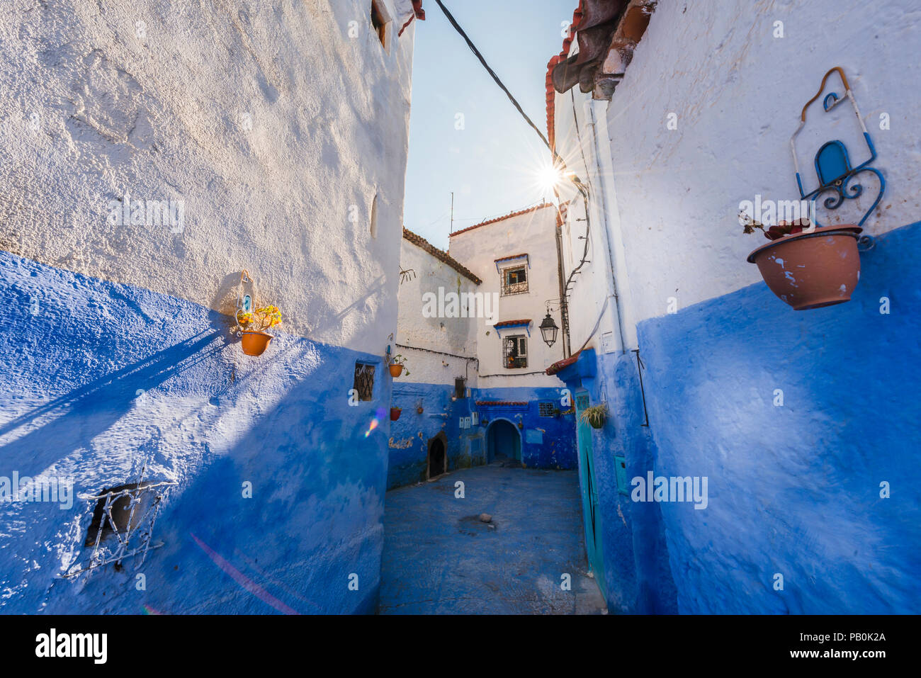 Narrow alley, blue houses, medina of Chefchaouen, Chaouen, Tangier